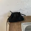 2026 Invierno Nuevo Elegante Estilo Francés Nicho Texturizado Plisado Moda Versátil Bolso de Hombro Cruzado de Mano Transfronterizo