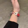 Adecuado para Correa de Apple S1011 Watch, Nuevo Color Otoño e Invierno Bloqueo de Color Patrón de Cuero Manzana Cachorro Rojo Arroz Combinación456 Pulsera