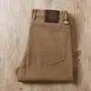 Estación europea otoño e invierno pantalones de algodón gruesos color caqui sarga elástica para hombre de negocios pierna recta pequeña vaqueros casuales