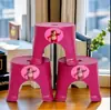 Taburete infantil de plástico engrosado para uso doméstico, taburete bajo apilable para baño, taburete de dibujos animados antideslizante para cambiarse los zapatos, venta al por mayor con impresión de logotipo