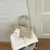 Bolso de Mano Pequeño Shuai Mi Jia para Mujer 2026 Nuevo de Principios de Otoño Moderno Elegante Bolso de Hombro de Nicho para Viajes Diarios Bolso Cruzado
