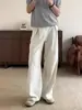 Otoño 2026 Ropa de Calle Color Sólido Pantalones Fluidos Estilo Japonés Minimalista Versátiles Adelgazantes Alargadores de Piernas Ligeramente Acampanados Pantalones de Moda
