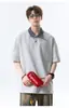 Verão 2026 Novo Estilo Masculino Camiseta Patchwork Xadrez Falsa de Duas Peças Marca Americana Tendência Camisa Polo de Manga Curta Camiseta com Gola para Homens