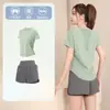 Conjunto profesional de ropa deportiva para correr para mujer, nueva colección de verano, ropa atlética transpirable y de secado rápido, de manga corta, elegante conjunto de yoga