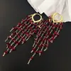 Brincos de Borla de Cristal Vermelho, Design de Nicho Novo e Moderno, Brincos Longos de Alta Qualidade, Brincos de Noiva Únicos Atacado