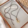 Collar Melard Retro Ojo de Tigre Corazón Hueco Estilo Nuevo Lujo Ligero Sensación de Alta Gama Cadena para Suéter Collar con Colgante de Nicho Accesorios