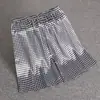 Pantalones de pijama finos de seda para hombre, verano, seda, holgados, casuales, talla grande, pantalones para casa, color liso, shorts de seda helada