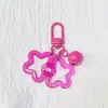 Estrella Hueca de Cinco Puntas Acrílica Campana Hebilla de Puerta de Llave Llavero Cabeza de Bolso Cubierta de Auriculares Colgante Pequeño Decorativo Joyería Colorido