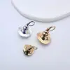 Cobre Chapado en Oro Alta Retención de Color Tapa Mágica Aguja de Medio Agujero Pegamento Colgante de Perla Soporte Vacío Accesorios para Collar Pendiente DIY