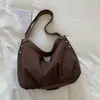 Bolsa de lona 2026 para mujer, gran capacidad, adecuada para todas las estaciones, color liso, simple y versátil, mochila para estudiantes universitarios, bolso cruzado