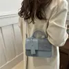 Bolso de Mano Pequeño de Color Contrastante Moda Retro al por Mayor 2025 Nuevo Bolso Cuadrado Pequeño Simple Versátil Bolso Cruzado con Textura