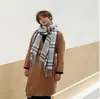 Bufanda de cuadros para hombre y mujer, chal para parejas, versión coreana de otoño e invierno, venta al por mayor de fábrica, cachemir sintético, suave, ceroso, cómodo, colores completos