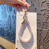 Corda de telefone versátil, corrente para celular, pulseira de pulso de TPU colorida, estilo europeu e americano, cordão durável anti-perda para capa de celular