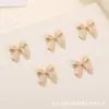 Jóias de unha de arco explosivo resina tridimensional pequeno arco diy decoração de unhas acessórios Joker atacado