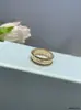 Anillo Firma Calidoscopio Trébol de Cuatro Hojas Anillo Clásico Versión de Alta Gama Anillo de Aros con Perlas de Oro V Chapado en Oro de 18 Quilates Apilable y Versátil