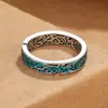 Anillo estilo étnico retro esmaltado con patrón de hierba Tang para hombres y mujeres mismo estilo artesanía envejecida personalidad moda Moda Nacional pulsera abierta