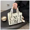 Bolso de Lona para Mujer Otoño e Invierno 2025 Nuevo Estampado de Letras en Contraste Correa de Hombro Colorida Bolso Cruzado de Hombro Manual Casual