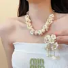 Pendientes y accesorios de collar florales frescos de verano, pendientes de borla para mujer estilo dulce, juego de joyería de lujo ligero de alta gama