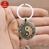 Comercio Exterior Exportación Yin-Yang Feng Shui Piedra del Tiempo Llavero Colgante Retro Moda Europea y Americana Colgante de Vidrio Llavero