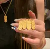 Colgante de la Suerte para Romper el Hielo y Atraer la Fortuna de Tendencia en Xiaohongshu Barra de Oro Pequeña Generadora de Riqueza Mensaje de Suerte Moda Exquisita para Mujeres