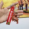 Nuevo Llavero Femenino Lindo Muñeco de Nieve Anciano Muñeca Colgante para Mochila Escolar Masculina Pareja Fábrica Colgante de Árbol de Navidad Dibujos Animados