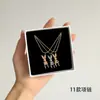 [56] logotipo de comercio exterior sin marca acero de titanio joyería Europa y Estados Unidos variedad de hip-hop apilado collar de clavícula de acero de titanio
