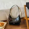Otoño 2026 Nuevo Elegante Chic Bolso de Hombro de Moda Estilo Bollo Bolso Cruzado de Hombro Único de Alto Valor Bolso Cruzado de Nicho