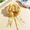 Embalagem de presente de Natal transfronteiriça nova flor de puxar média 30 três fio dourado flor de puxar à mão bola tridimensional flor de plástico