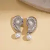 Pendientes Minimalistas Europeos y Americanos con Patrón de Caracola y Perlas Artificiales, Estilo Vacaciones en la Costa, Pendientes de Moda de Nicho de Gama Alta