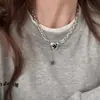 Collar de Corazón Negro Lava para Mujer, Moderno y Versátil, Cadena de Suéter Única con un Diseño Elegante, Cadena de Sudadera Personalizada para Hombre