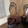 Bolsa de Axila Vintage de Luxo com Laço para Mulheres, Nova Versátil de Nicho Outono e Inverno para Ombro e Mão