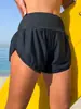 2026 Shorts de Praia Pretos de Cintura Alta com Controle de Barriga Europeus e Americanos Secagem Rápida Soltos Calças Esportivas Anti-Exposição Calças de Surf Roupa de Banho