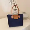 Tendencia transfronteriza bolsa de mano fresca para mujer 2026 otoño nuevo color sólido simple bolso de hombro único bolso de axila para ir al trabajo