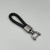 Chaveiro de ferradura para carro multicolor portátil criativo para chave de carro simples corda de couro trançada pingente chaveiro atacado