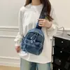 Mochila de mezclilla estilo coreano para estudiantes, simple y elegante, gran capacidad, adecuada para ir al trabajo, mochila pequeña para viajes, riñonera 2026