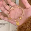[Riqueza de Todas as Direções] Pulseira de Cristal Sintético de Luxo Leve para Mulheres, Pingente de Medalha de Ouro Abóbora, Pulseira de Contas, Pulseira