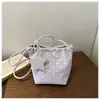 Elegante y Fresca Bolsa de Cubo Dulce con Cordón para Mujer 2026 Nueva Moda Versátil Bolso de Hombro para Viajes Diarios Bolso Cruzado