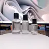 Productos de Botellas de Perfume Transparentes de Vidrio, Botellas Recargables, Botellas Vacías con Atomizador de Presión, Personalizadas de Alta Gama 50ml