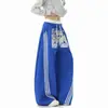 Estampa graffiti bicolor estilo americano, cós com três listras, corte solto unissex, calça esportiva de perna larga e caimento fluido para o outono