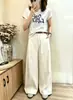 Camiseta de algodón acanalado para mujer con mangas dobladas, top ajustado de manga corta, stock de verano de la fábrica de origen, suministrado exclusivamente a mayoristas en Shisanxing