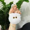 Llavero de bola de carbón de red cross-border nuevo, juego de imitación de conejo de Seto, elfo, colgante de bolsa de bola de carbón pequeña, colgante de coche, venta al por mayor