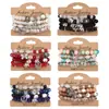 25 Pulseras Populares de Estilo Bohemio Étnico Europeo y Americano Colgante de Mariposa Ancla Elefante Pulsera Elástica Multicapa Venta al por Mayor