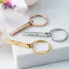 Llavero de barra cuadrada de acero inoxidable de color contrastante exclusivo transfronterizo para letras DIY nombre de familia regalo de Navidad fabricante