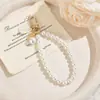 Colgante llavero de concha de perla, correa creativa para teléfono, perla, simple y elegante, exquisito, pequeño y delicado, diseño de cuentas hecho a mano