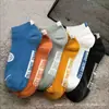 Calcetines deportivos de boca baja y caña baja para hombre calcetines tipo mocasín de moda para hombre suministro de puesto al por mayor calcetines casuales para hombres y mujeres estudiantes
