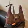Bolso de axila de alta gama transfronterizo para mujer, nuevo bolso de hombro de moda y versátil para el otoño de 2026, bolso tipo dumpling para ir al trabajo