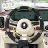 Cubierta de volante de coche de camelia, algodón y lino, transpirable, antideslizante, cubierta de mango de volante de coche, universal para las cuatro estaciones, suministros para coche