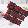 Venta al por mayor de cajas de regalo negras de alta gama con tapa y base, con un lazo decorativo, adecuadas para recuerdos y regalos; Cajas de regalo personalizadas disponibles