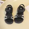 Sandalias para Niñas 2026 Verano Nuevo Estilo Zapatos de Princesa de Suela Suave para Niños Pequeños Zapatos de Playa para Bebés Zapatos de Playa de Moda