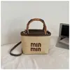 Bolsa de Palha Tecida Estilo Férias na Praia para Mulheres 2026 Nova Tendência Bolsa de Mão para o Dia a Dia Bolsa Saco Bolsa Transversal de Nicho